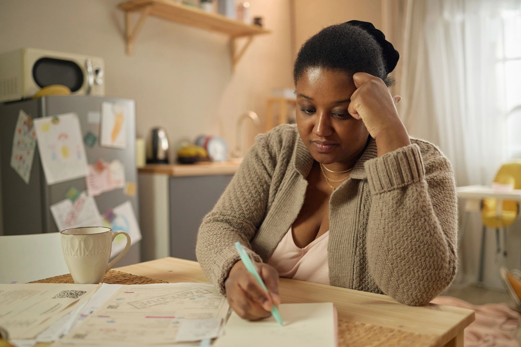 Homeowner reviewing paperwork at home